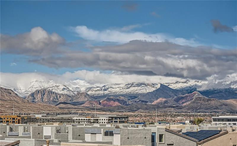 Snow-capped Spring Mountains and Las Vegas Valley viewed from the rooftop deck